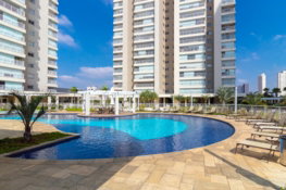 a-pool-in-a-courtyard-with-tall-buildings-in-the-background.jpg a pool in a courtyard with tall buildings in the background